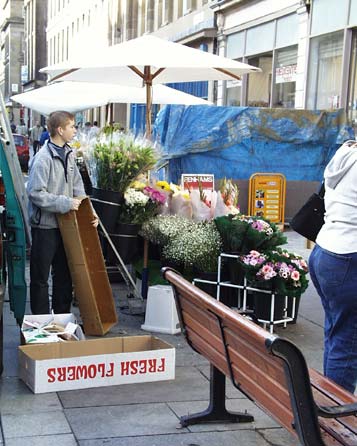 Flower seller near Grainger Market entrance